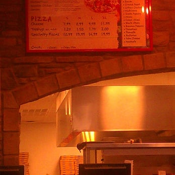 Marco's Pizza - a menu on a brick wall - Pizza Near Me - Bonaire, Georgia Marco's Pizza - a menu on a brick wall - Pizza Near Me - Bonaire, Georgia