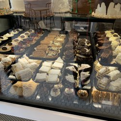 Henri's Bakery & Deli - Tiramisu was Ok, barely tasted the coffee. Eclair tasted hard and stale.