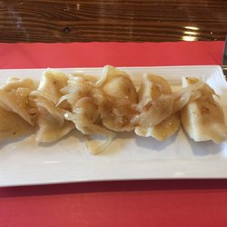Potatoe and cheese pierogi platter with sauteed onions