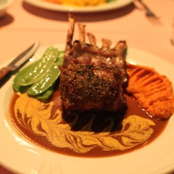 La Vie - beautiful, wonderful lamb with an amazing sauce, beautiful leaf design, yam, peas, and scalloped potatoes behind the lamb. - French Near Me - Rosemead, California La Vie - beautiful, wonderful lamb with an amazing sauce, beautiful leaf design, yam, peas, and scalloped potatoes behind the lamb. - French Near Me - Rosemead, California