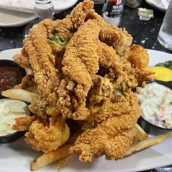 Deanie's Restaurant & Bar - This was the seafood combo with catfish, shrimp and oysters. I took home half the plate. I could not eat it all. - Seafood Near Me - New Orleans, Louisiana