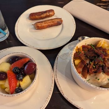 First Watch - Small fruit bowl, pork sauce and million dollar potatoes - Breakfast & Brunch Near Me - Bloomingdale, Illinois