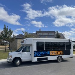 290 Wine Shuttle - Shuttle bus parked at a winery.