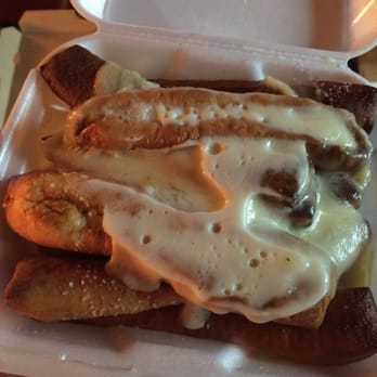 B.C. Pizza - Breadsticks with cheese on top. - Pizza Near Me - Charlevoix, Michigan B.C. Pizza - Breadsticks with cheese on top. - Pizza Near Me - Charlevoix, Michigan