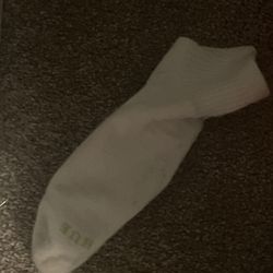 The Village At Blue Mountain Beach - Random sock that was wedged between bench