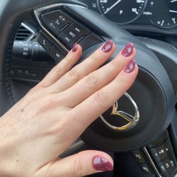 C A Nails - Asked for dip with a tip. $57. Not pleased with the divots in the nail and how thin/cheap it looks.