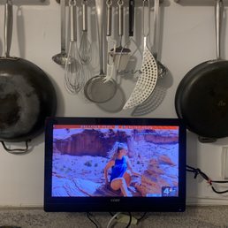 TV mounted in kitchen TV mounted in kitchen