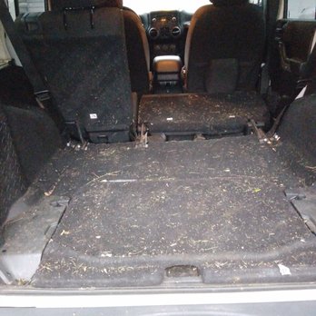 Brightshine Auto Spa - Before covered in grass, wood chips, dog hair and dirt. - Auto Detailing Near Me - Worcester, Massachusetts