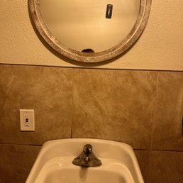 Mirror too high for a 5'2" person. Can't check my teeth nor touch up my red lipstick. Mirror too high for a 5'2" person. Can't check my teeth nor touch up my red lipstick.