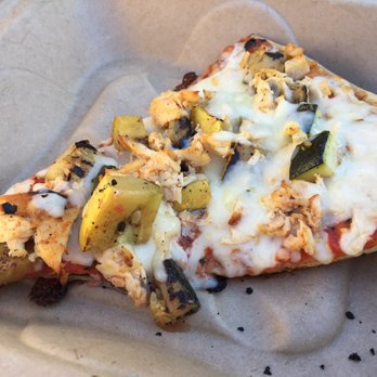 AJ's Wood Grill Pizza - Chicken and zucchini slice of pizza - Pizza Near Me - Kittery, Maine