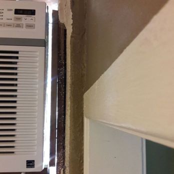 Gurzi Builders - a window air conditioner - General Contractors Near Me