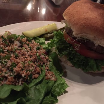 Spotted Dog - California burger with guacamole and spouts on it with a wheat bun. Tabouli salad on the side. - Vegetarian Near Me - Carrboro, North Carolina Spotted Dog - California burger with guacamole and spouts on it with a wheat bun. Tabouli salad on the side. - Vegetarian Near Me - Carrboro, North Carolina