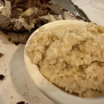 Lake Oconee Bistro - Big brisket sandwich with cheesey grits - Venues & Event Spaces Near Me - Eatonton, Georgia