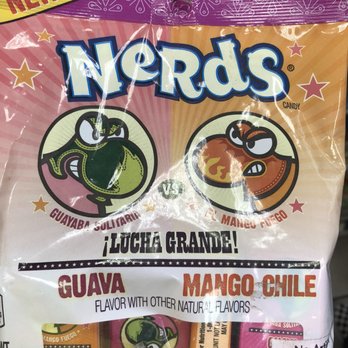 ampm - a hand holding a bag of nerds - Convenience Stores Near Me - Lamont, California