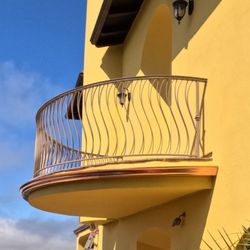 CR Gutters - Radius Copper balcony gutter.