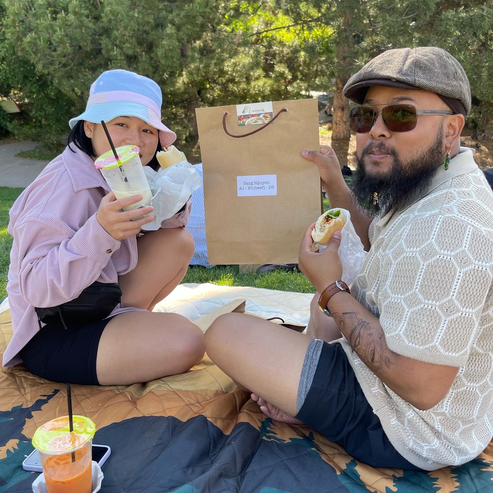 Vinameals - A lovely couple enjoying their banh mi and drinks. - Vietnamese Near Me - Littleton, Colorado Vinameals - A lovely couple enjoying their banh mi and drinks. - Vietnamese Near Me - Littleton, Colorado