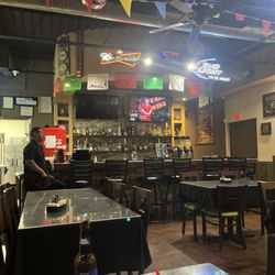 They have a full bar, nice and clean. Has Spanish music softly playing.