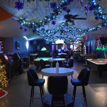 Woody's - a christmas tree and pool tables - Gay Bars Near Me - Milwaukee, Wisconsin