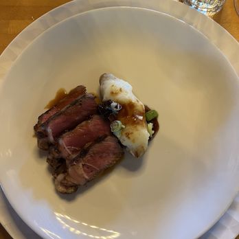 Freight House - NY Strip with house bone sauce and a twice baked finger length potato - American Near Me - Paducah, Kentucky Freight House - NY Strip with house bone sauce and a twice baked finger length potato - American Near Me - Paducah, Kentucky