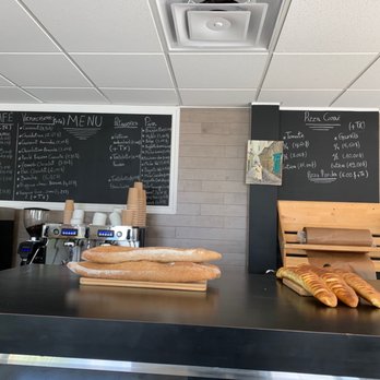 Tel Père Tel Fils - a bakery counter with bread and pastries - Bakeries Near Me - Montreal, Quebec Tel Père Tel Fils - a bakery counter with bread and pastries - Bakeries Near Me - Montreal, Quebec