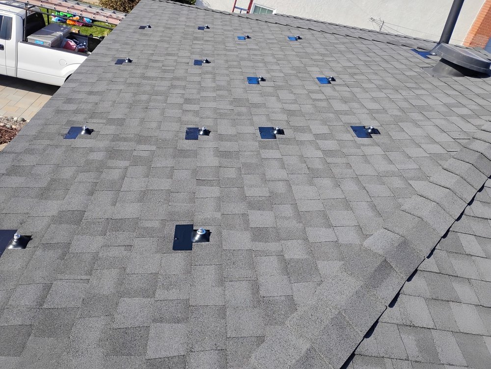 Slide of Sam's Roofing Co