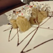 Photo of Volcano Japanese Restaurant - Morgantown, WV, United States. free fried banana dessert.