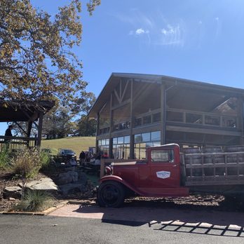Reeces Cider - Outside. Live music on the left and plenty of seating with no shortage of bars! - Cideries Near Me - Ellijay, Georgia Reeces Cider - Outside. Live music on the left and plenty of seating with no shortage of bars! - Cideries Near Me - Ellijay, Georgia