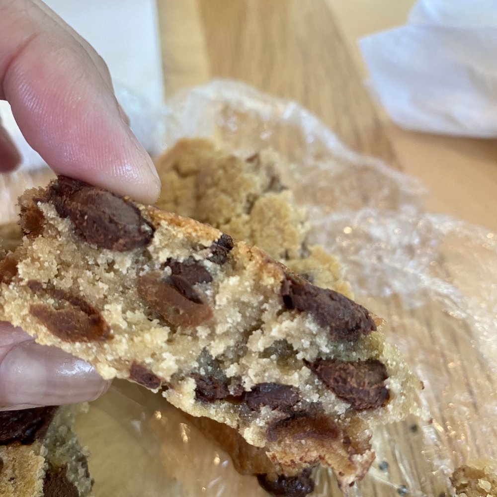 Lee's Sandwiches - a hand holding a half eaten cookie - Sandwiches Near Me - San Jose, California Lee's Sandwiches - a hand holding a half eaten cookie - Sandwiches Near Me - San Jose, California
