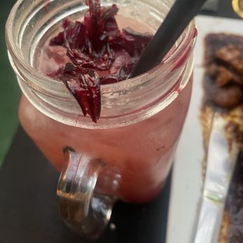 Charm Bar & Restaurant - Sorrol cocktail drink - Caribbean Near Me - Brooklyn, New York Charm Bar & Restaurant - Sorrol cocktail drink - Caribbean Near Me - Brooklyn, New York
