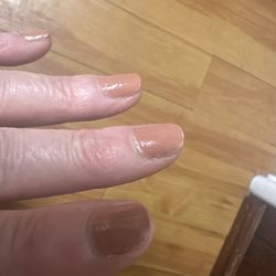 Colonics by Bonnie - Bumpy uneven third coat of nail polish over original.