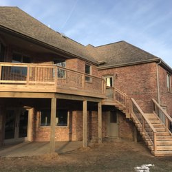 GM Construction - Cedar decking, cedar railing, 3/4 round black spindles.