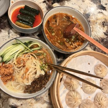 Supreme Dumpling Stonestown - Supreme Pork Xiao Long Bao (8), Hot & Sour Soup,  Spicy Cucumber Salad & Supreme Tan Tan Noodles - Dim Sum Near Me - San Francisco, California