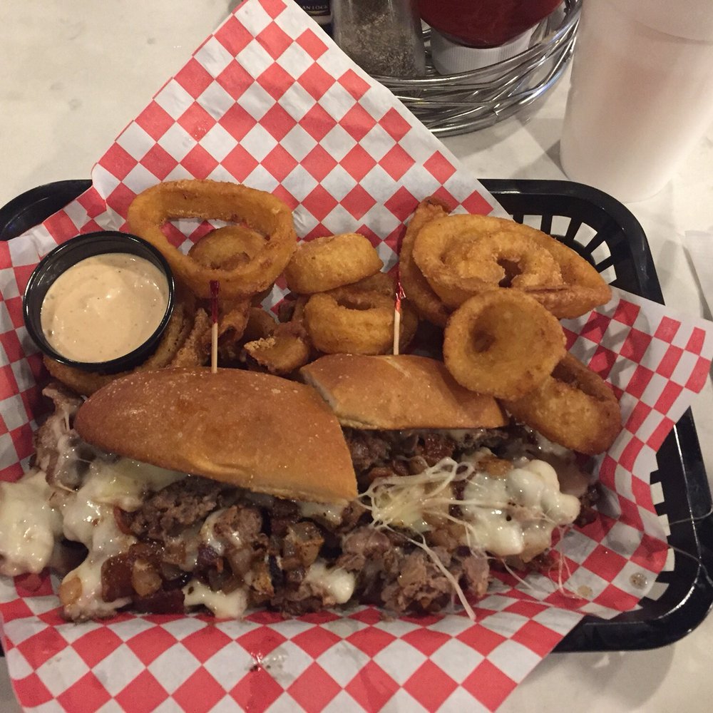 Wildfire Boulder - Philly cheese steak grilled to perfection. With a side of onion rings and wild sauce - Casinos Near Me - Henderson, Nevada Wildfire Boulder - Philly cheese steak grilled to perfection. With a side of onion rings and wild sauce - Casinos Near Me - Henderson, Nevada