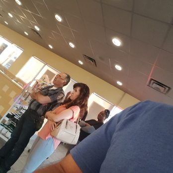Krispy Kreme - Why all these folks are crowding way over there is beyond me...lines over here. - Donuts Near Me - Long Beach, California