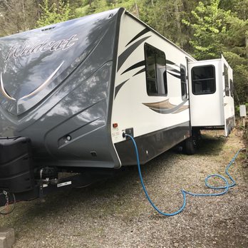 Camp CDA  - Our site, which was a bit cramped for our style of rving. But the trees and hand stacked rock walls were very cool - RV Parks Near Me - Coeur d'Alene, Idaho