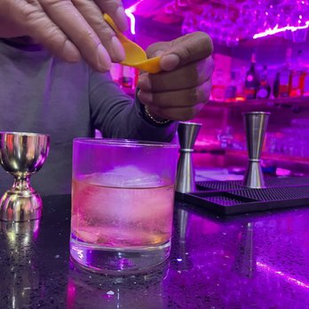 Coyote Bohemio - a bartender mixing a drink - Mexican Near Me - Ridgewood, New York