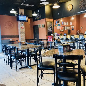 Melita's Restaurant & Bar - tables and chairs - Salvadoran Near Me - Houston, Texas Melita's Restaurant & Bar - tables and chairs - Salvadoran Near Me - Houston, Texas