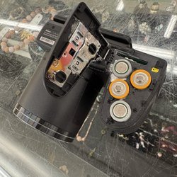 Savers - Extremely disgustingly, corroded and broken camera that SAVER in Santa Fe is trying to sell! Price $149.99 Broken Camera