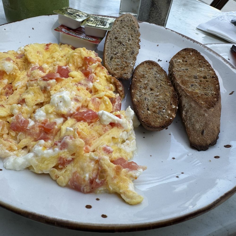 Crema Gourmet  - Feta Cheese & Tomatoes, multi grain toast, side of Turkey bacon - Breakfast & Brunch Near Me - Dania Beach, Florida
