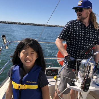 LA Sailing - My daughter and Captain Kevin. He lets you relax or get involved in the sailing process. - Boat Charters Near Me LA Sailing - My daughter and Captain Kevin. He lets you relax or get involved in the sailing process. - Boat Charters Near Me