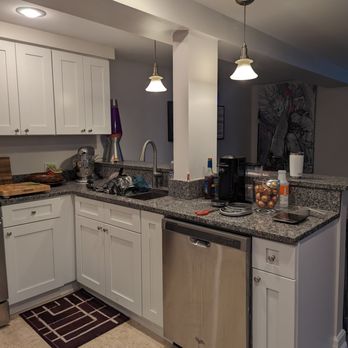 Rapid Response Restoration - New kitchen... Cabinets, dry wall, countertops, flooring, sink - Damage Restoration Near Me - Chicago, Illinois