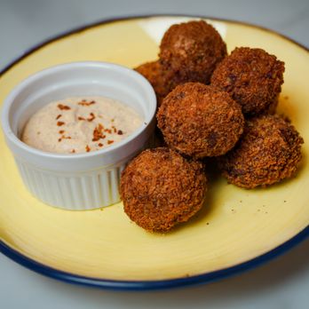 Kountry Boy Sausage - Boudin Balls made with Kountry Boys Kajun-Style Boudin fry up golden, crispy and impossible to stop snacking on. - Meat Shops Near Me - Brenham, Texas Kountry Boy Sausage - Boudin Balls made with Kountry Boys Kajun-Style Boudin fry up golden, crispy and impossible to stop snacking on. - Meat Shops Near Me - Brenham, Texas