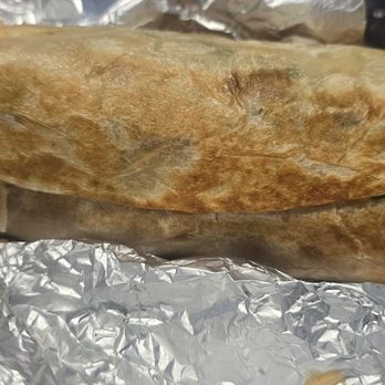 Tacos Tacos Y Antojitos - Carne Asada burrito with 10 lbs of beans - Tacos Near Me - Riverside, California Tacos Tacos Y Antojitos - Carne Asada burrito with 10 lbs of beans - Tacos Near Me - Riverside, California