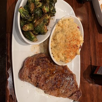LongHorn Steakhouse - 12 oz Ribeye 2 sides: Crispy Brussels Sprouts and Mac & Cheese with bacon - Steakhouses Near Me - Roswell, Georgia LongHorn Steakhouse - 12 oz Ribeye 2 sides: Crispy Brussels Sprouts and Mac & Cheese with bacon - Steakhouses Near Me - Roswell, Georgia