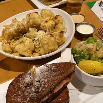 Claim 52 Kitchen - Monte Cristo with Caesar Salad, crispy cauliflower appetizer, Cuban sandwich with fries. - Gastropubs Near Me - Eugene, Oregon