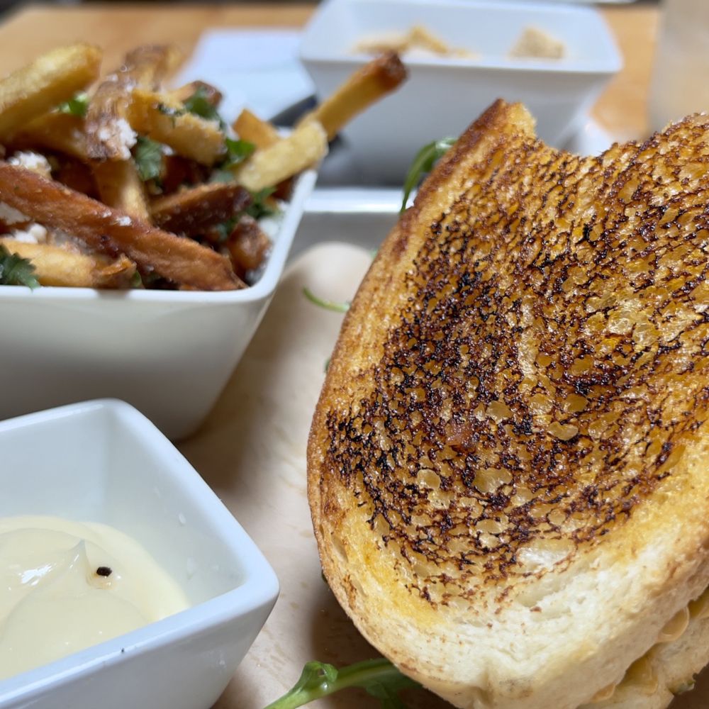 Scratch Kitchen & Taproom - Scratch BLT Candied Bacon, Arugula, Cold-Smoked Green Tomatoes, Korean Mayo. Served on A Lightly Toasted Stick Boy Sourdough Bread. - Bars Near Me - Apex, North Carolina Scratch Kitchen & Taproom - Scratch BLT Candied Bacon, Arugula, Cold-Smoked Green Tomatoes, Korean Mayo. Served on A Lightly Toasted Stick Boy Sourdough Bread. - Bars Near Me - Apex, North Carolina
