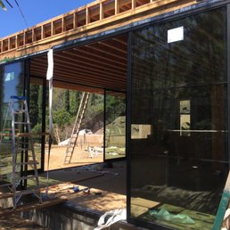 Exterior outside entrance of Roger Windows & Doors Installation - 12' multi slider Exterior outside entrance of Roger Windows & Doors Installation - 12' multi slider