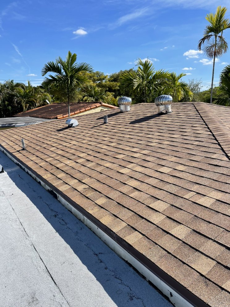 Slide of GT Roofing