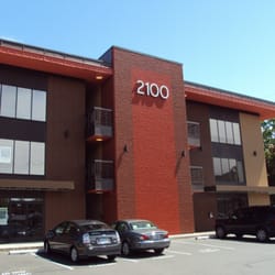Camille B Hook, LMT - A large parking lot with bike lock facilities. Entrance to lot can be accessed from both Weidler and Broadway st.