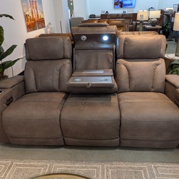 Ashley Store - Sofa at the showroom showing a strap handle on the tray table. - Furniture Stores Near Me - Oxnard, California